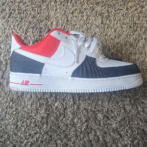 Stylish Low-Top Sneakers with Red and Blue Accents